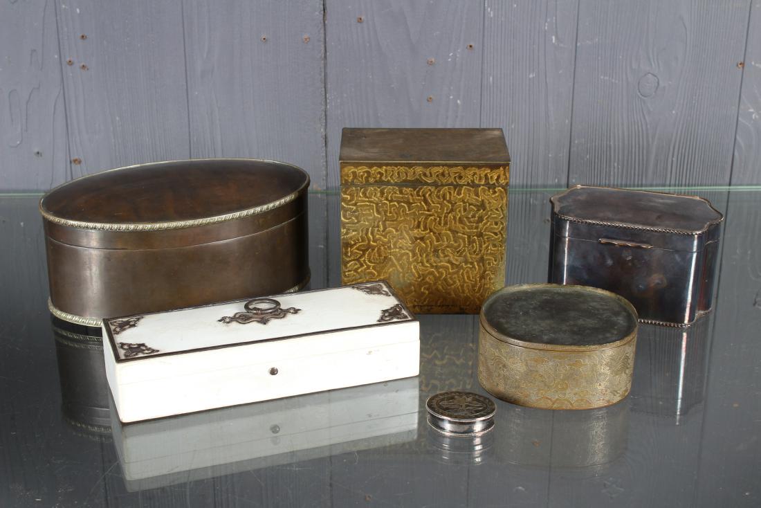 6 Decorative Boxes: 6 Decorative Boxes, includes silver plate Metropolitan Museum of Art small pill box, one box with dragon design. Size: Largest: 4" H x 9" W x 6" D