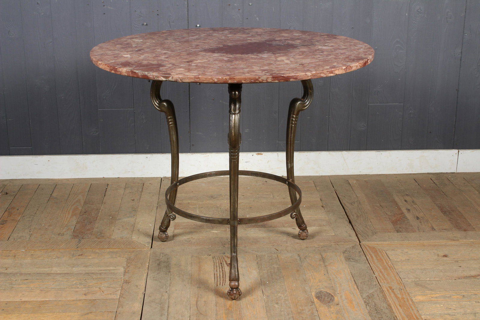 A Good Polished Figural Cast Iron Gueridon: A Good Polished Figural Cast Iron Gueridon having a marble top supported on 3 legs. Size: 29" H x 35.5" W x 35.5" D