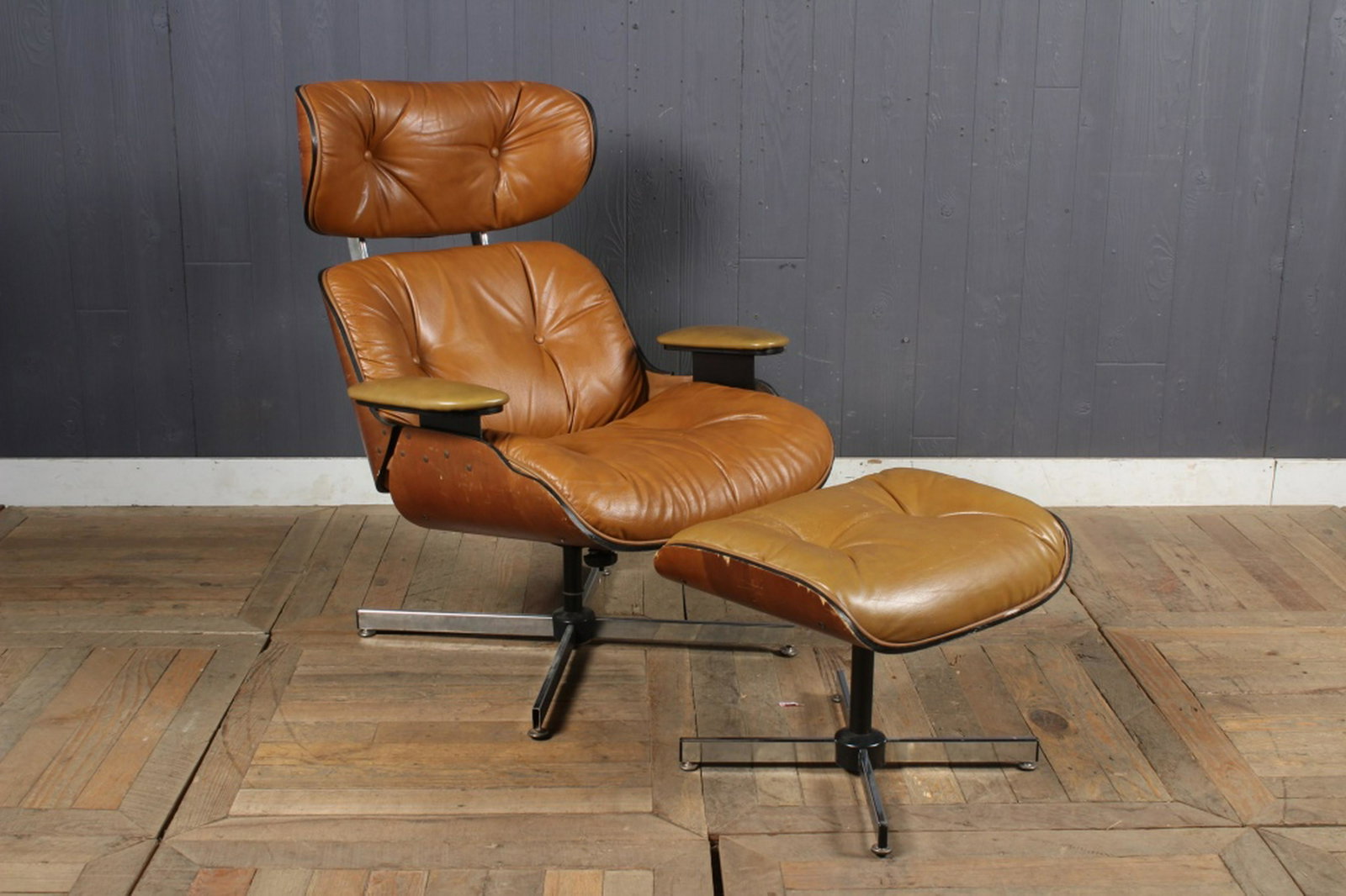 Plycraft Eames Style Lounge and Ottoman: Plycraft Eames Style Lounge and Ottoman, leather, button back. Size: Largest: 39" H x 33" W x 32" D