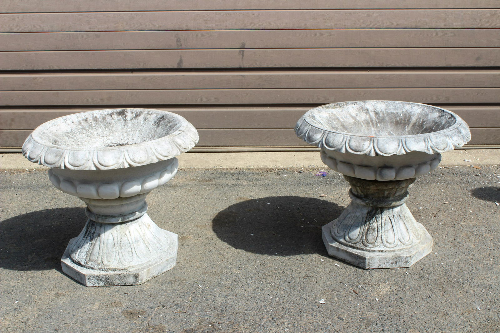 Pair of Campana Form Carved Marble Urns: Pair of Campana Form Carved Marble Urns. Size: 20" H x 24" W x 24" D