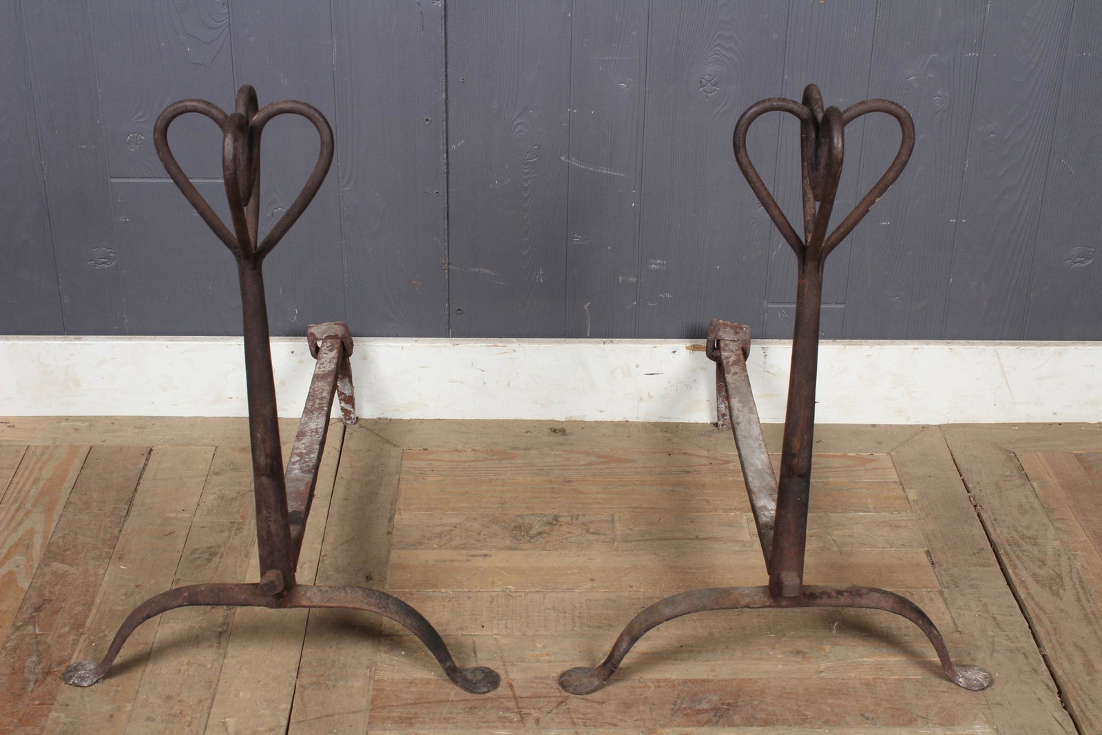 Wrought Iron Andirons: Wrought Iron Andirons, heart form top. Size: 24" H x 17" W x 24" D