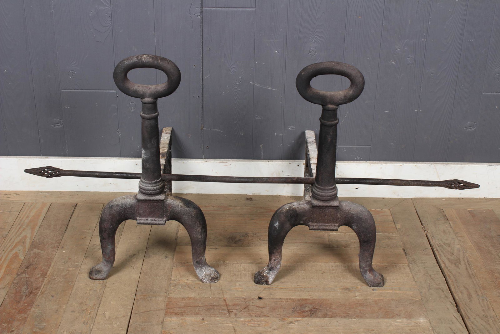 Wrought Iron Andirons: Wrought Iron Andirons, loop form tops, with cross bar. Size: 22.5" H x 12.5" W x 19" D