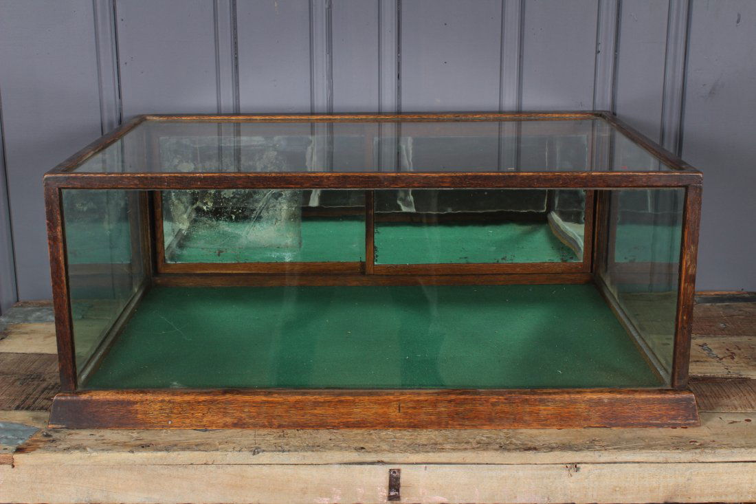 Tabletop Oak and Glass Display Case: Tabletop Oak and Glass Display Case. Size: 14.5" H x 36.5" W x 24.5" D.