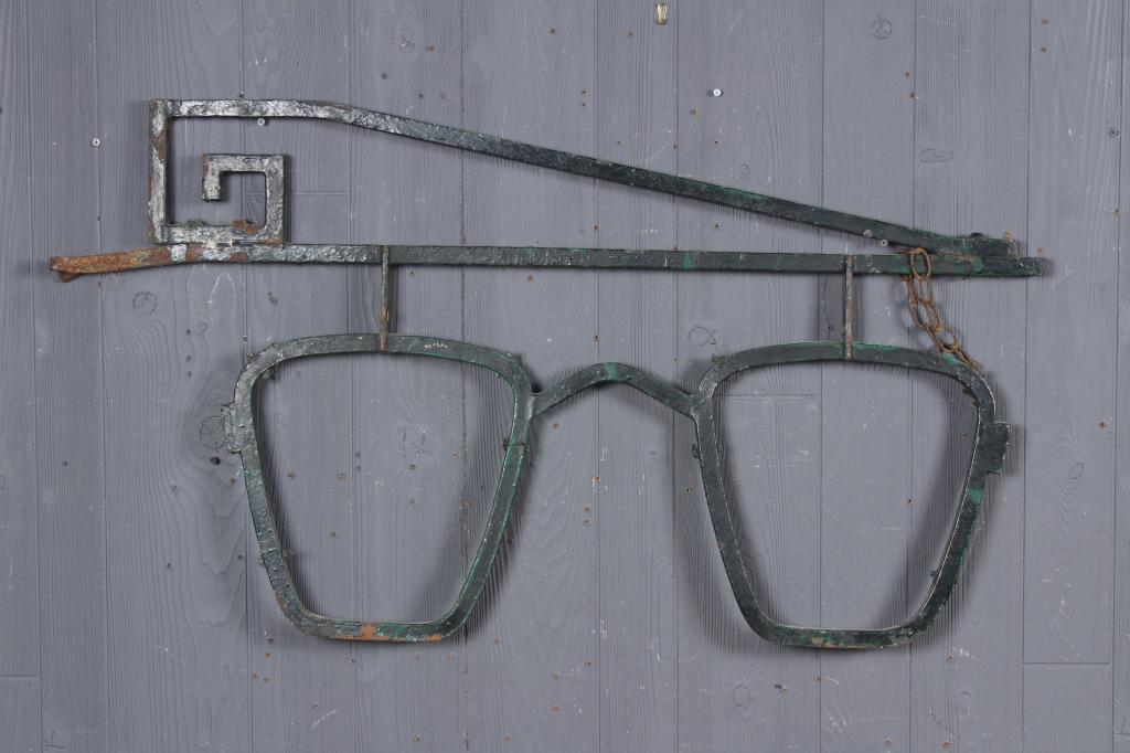 Wrought Iron Optometrist Trade Sign: Wrought Iron Optometry Trade Sign. Size: 24" H x 43.5" W x 1.5" D