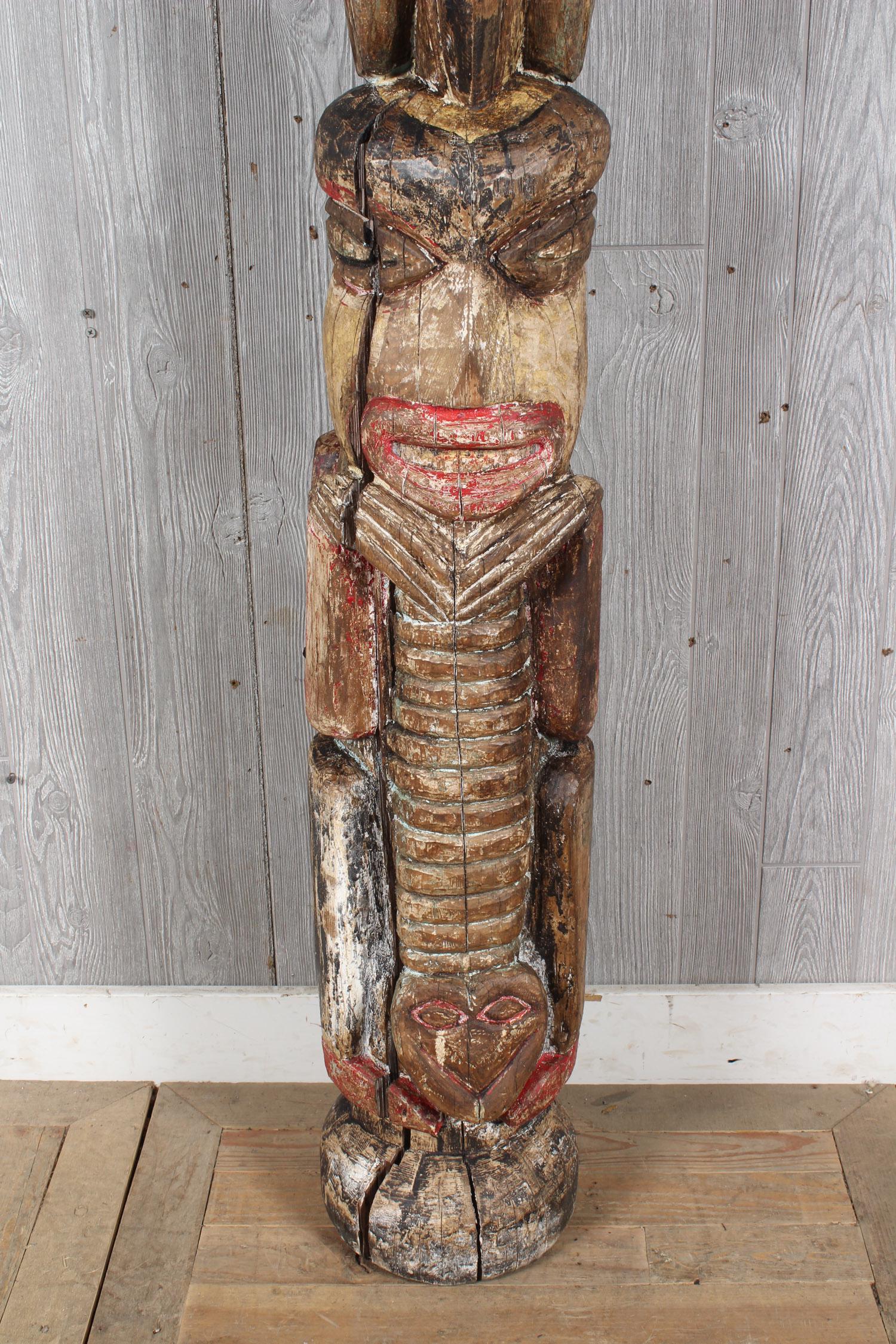 Pacific Northwest Coast Style Carved Wood Totem: Pacific Northwest Coast Style Carved Wood Totem. Age unknown. Carved and painted wood. Size: 94" H x 9.5" W x 9.5" D