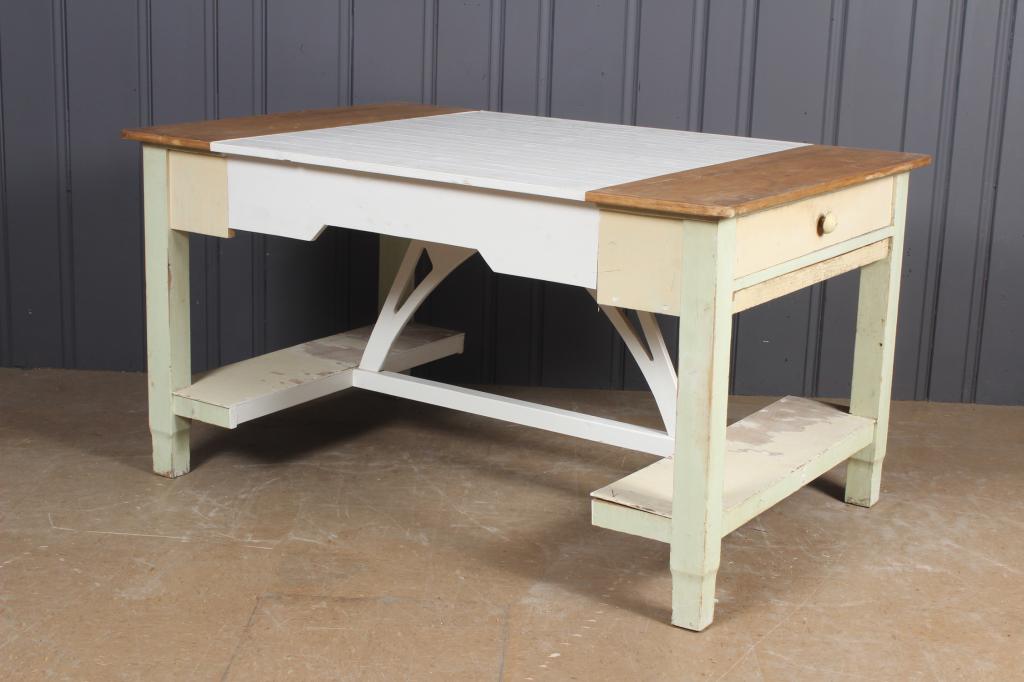 Upcycled and Reimagined Farmhouse Table: Upcycled and Reimagined Farmhouse Table. A formerly unrefined table infused with Secessionist style. From the Swarm Line of furniture offered by a famous lifestyle retailer. Single drawer. Size: 31.5"