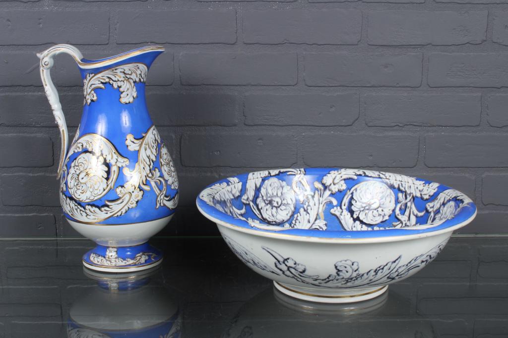 Pearlware Pitcher and Basin: Pearlware Pitcher and Basin, blue and white with gilt paint decorated foliate design, pitcher numbered on bottom 3098, and impressed Pearl. Size: Largest: 5" H x 14.75" Diameter