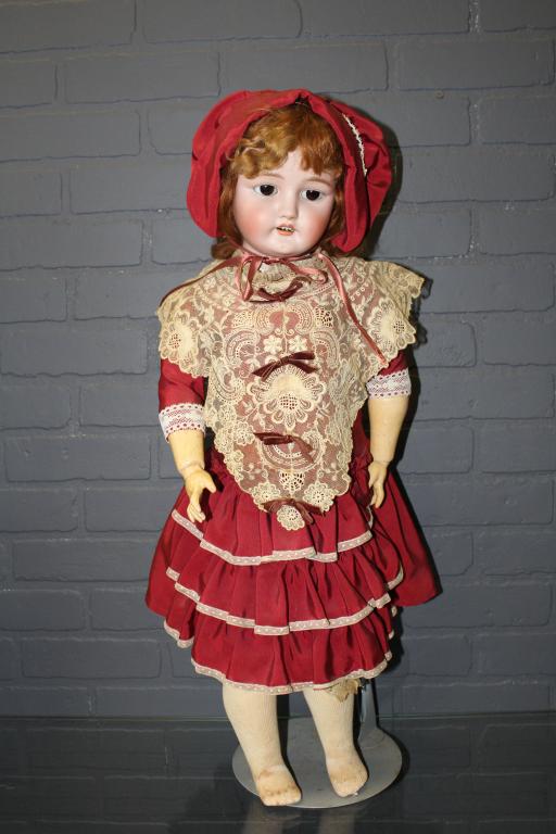 CM Bergmann Bisque Socket Head Doll: CM Bergmann Bisque Socket Head Doll, composition ball jointed body, brown glass sleep eyes, painted upper and lower lashes, multistroke eyebrows, open mouth with upper teeth, accented lips, pierced ea