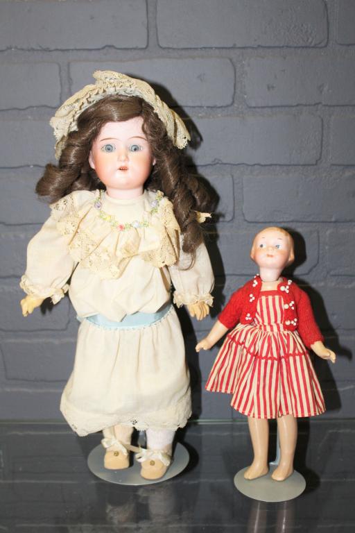 2 Armand Marseille Bisque Socket Head Dolls: 2 Armand Marseille Bisque Socket Head Dolls, includes a Marseille 210 bisque socket head, replaced composition jointed body, painted googly intaglio eyes, closed mouth, incised on head "210, A 10/0 M,