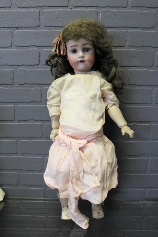 Kammer & Reinhardt Bisque Socket Head Doll: Kammer & Reinhardt Bisque Socket Head Doll, composition ball jointed body, blue glass sleep eyes, applied upper lashes, painted upper and lower lashes, feathered eyebrows, open mouth with upper teeth,