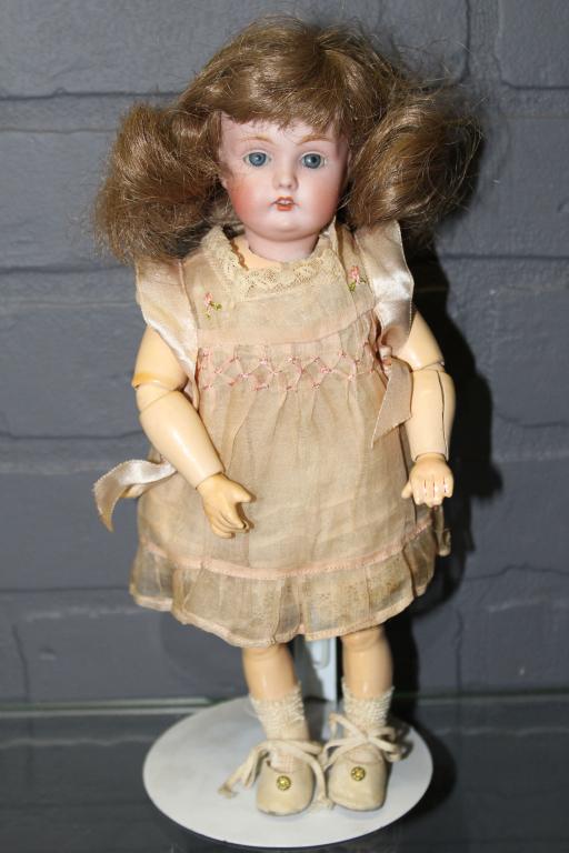 JD Kestner 174 Bisque Socket Head Doll: JD Kestner 174 Bisque Socket Head Doll, composition ball jointed body, blue glass sleep eyes, painted upper and lower lashes, eyebrows, open mouth with upper teeth, incised on head "A, Made in Germany