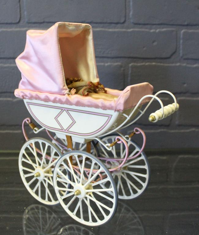 Marklin Limited Edition Doll Carriage: Marklin Limited Edition Doll Carriage, made in Commemoration of the 50th Anniversary of the United Federation of Doll Clubs, marked on bottom, with certificate of authenticity, with a small hard plast