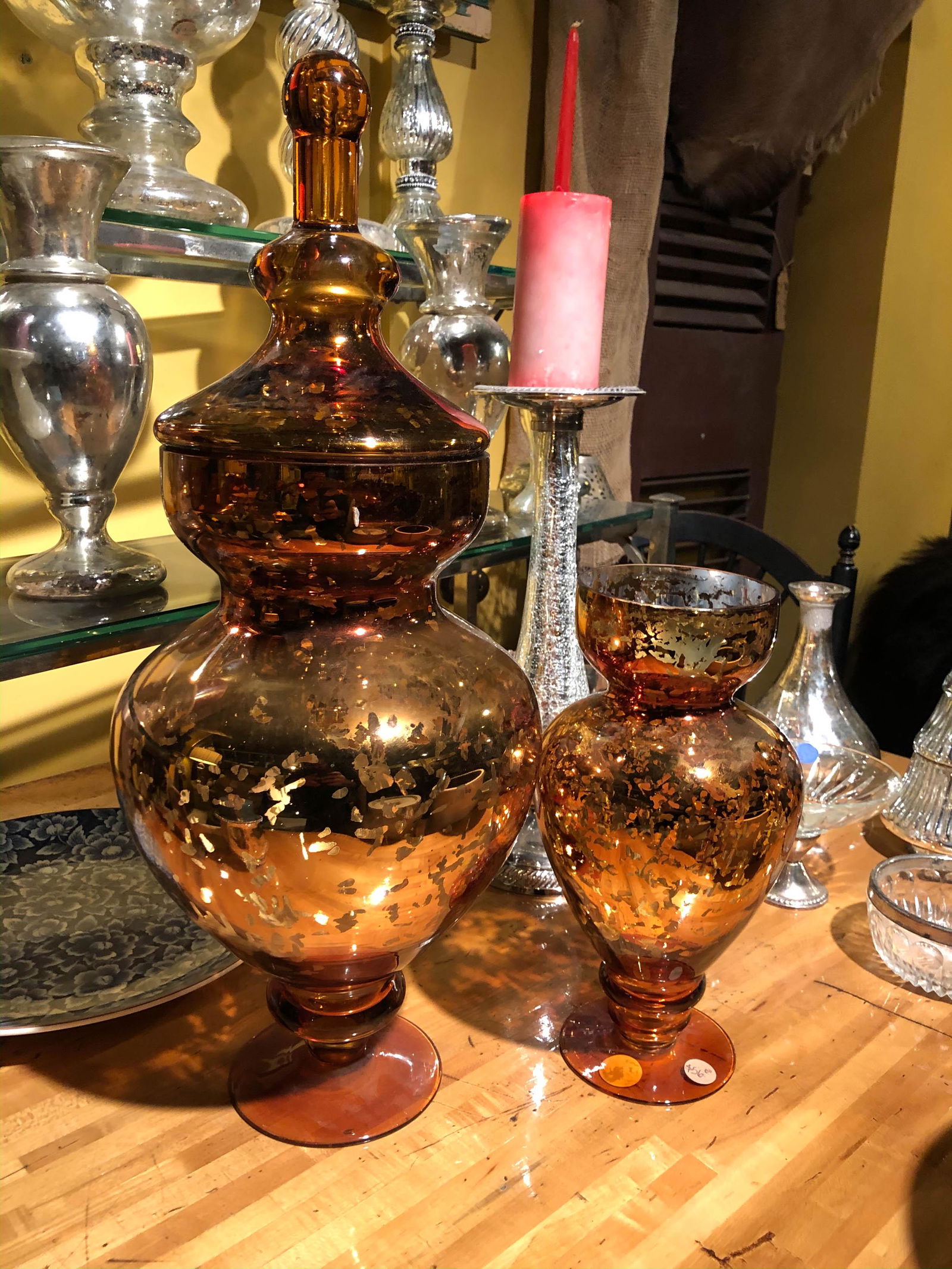 Lot of 2 Gold Tinted Mercury Glass Vessels: A lot of 2 Gold Tint Mercury Glass Style Vessels, One Lidded. Largest 22" x 8" dia.