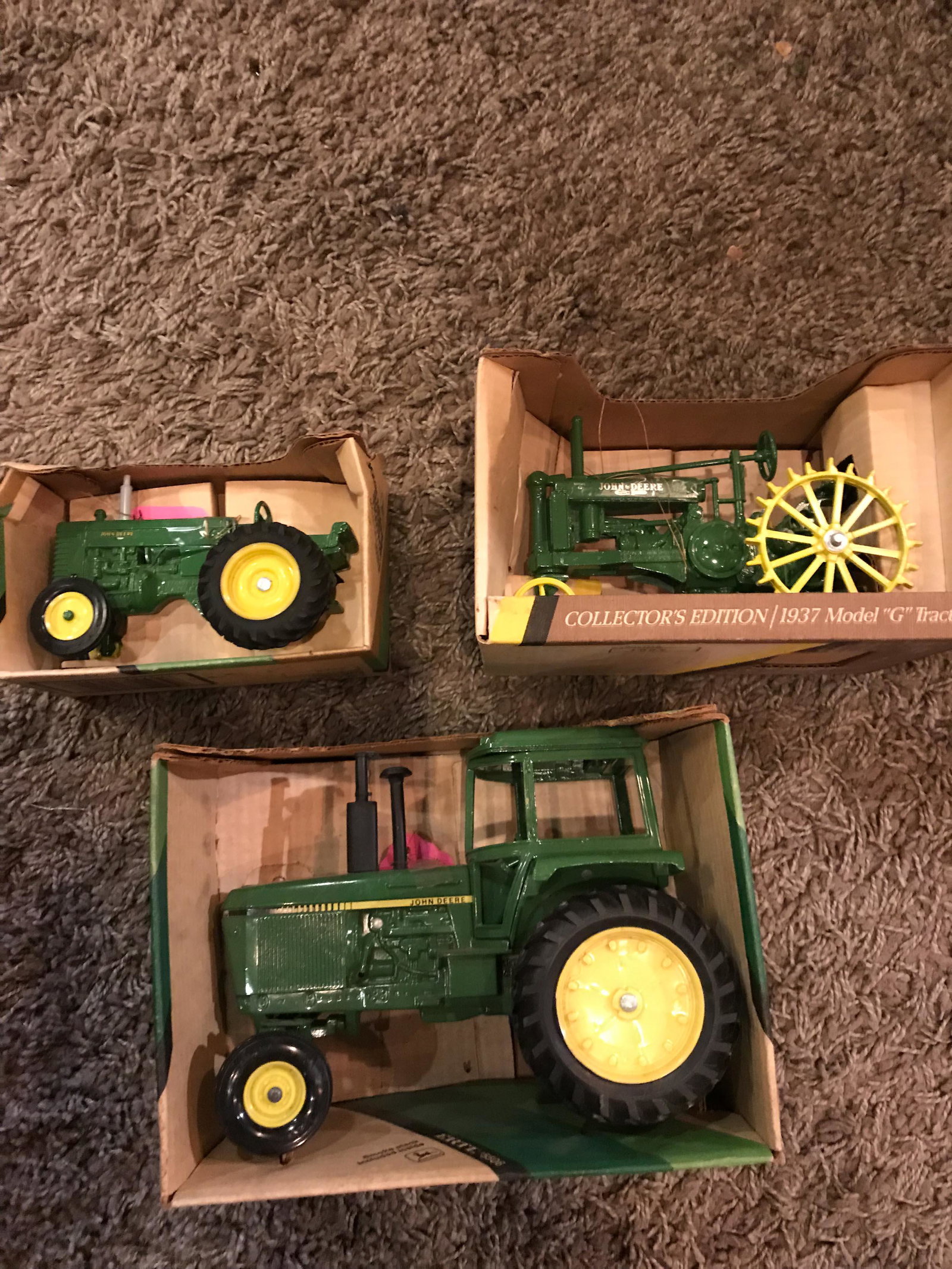 3 Piece John Deere Cast Metal Tractors: 3 Three Piece Lot of John Deere Cast Metal 1/16 Scale Tractors in Boxes. Various Sizes