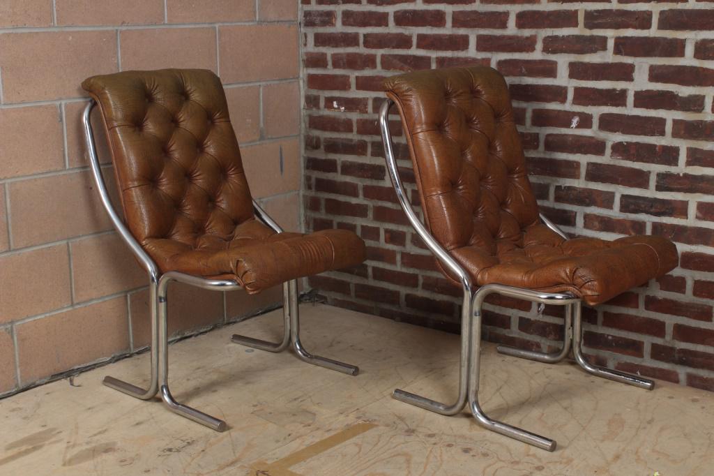 Pair Daystrom Chrome and Tufted Leather Chairs: Pair Daystrom Chrome and Tufted Leather Chairs, Daystrom Furniture Inc. label. Size: 36" H x 21" W x 26.5" D