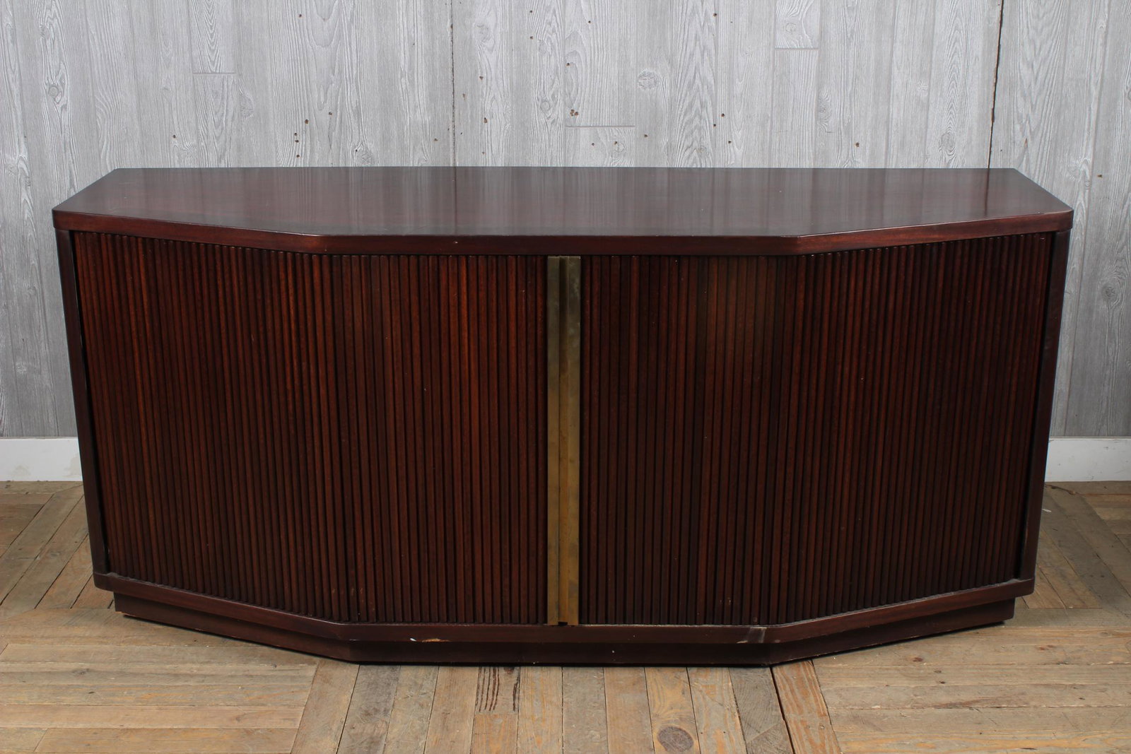 Mid Century Modern Sideboard: Mid Century Modern Sideboard having tambour doors with bronze hardware. Size: 33" H x 72" W x 24" D