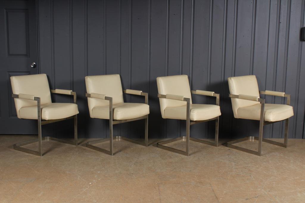 4 Chrome and Vinyl Armchairs: 4 Chrome and Vinyl Armchairs. Size: 33.5" H x 23" W x 24.5" D