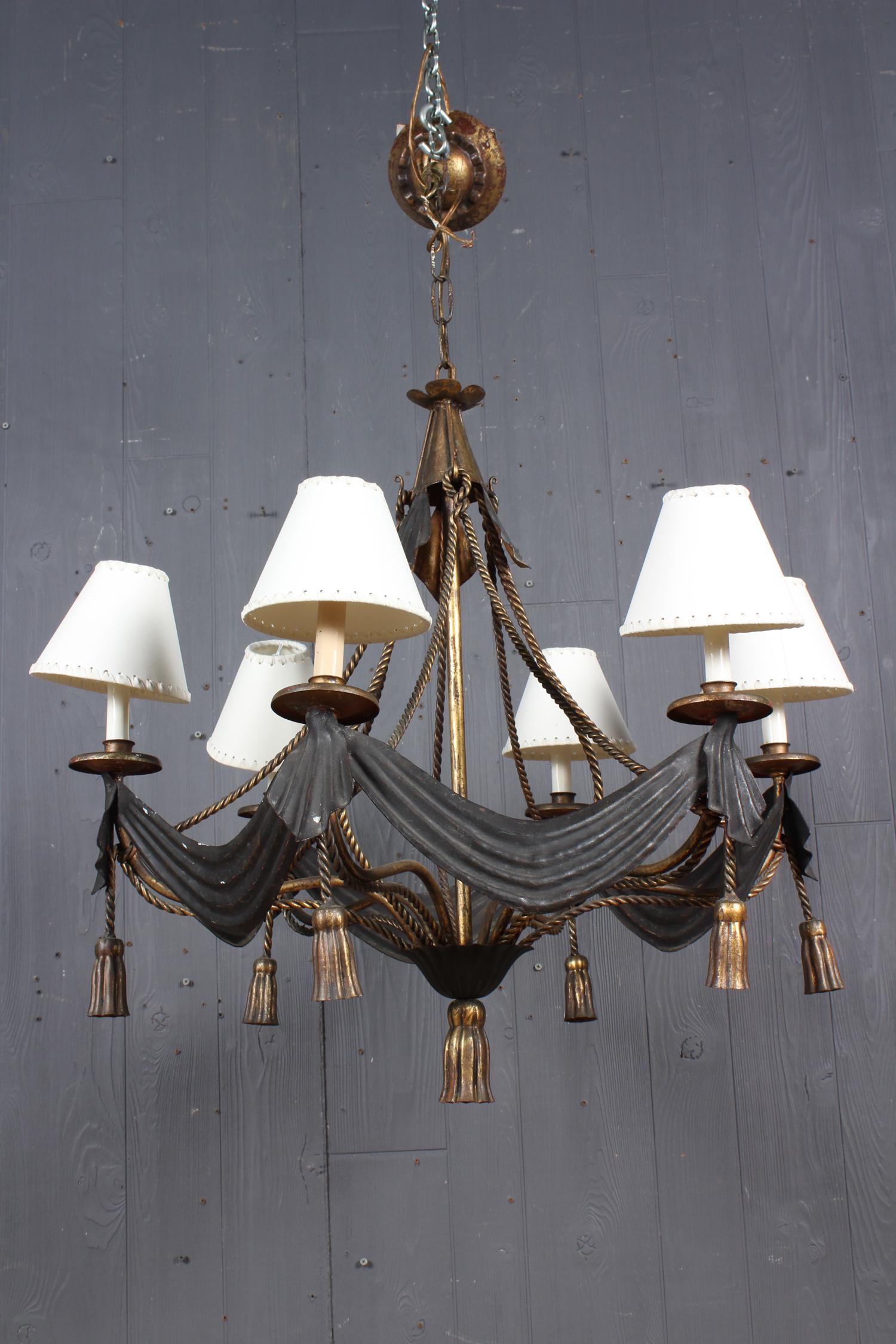 Gilt Decorated Wrought Iron and Tole Chandelier: Gilt Decorated Wrought Iron and Tole Chandelier. Size: 38" H x 30" W x 27" D