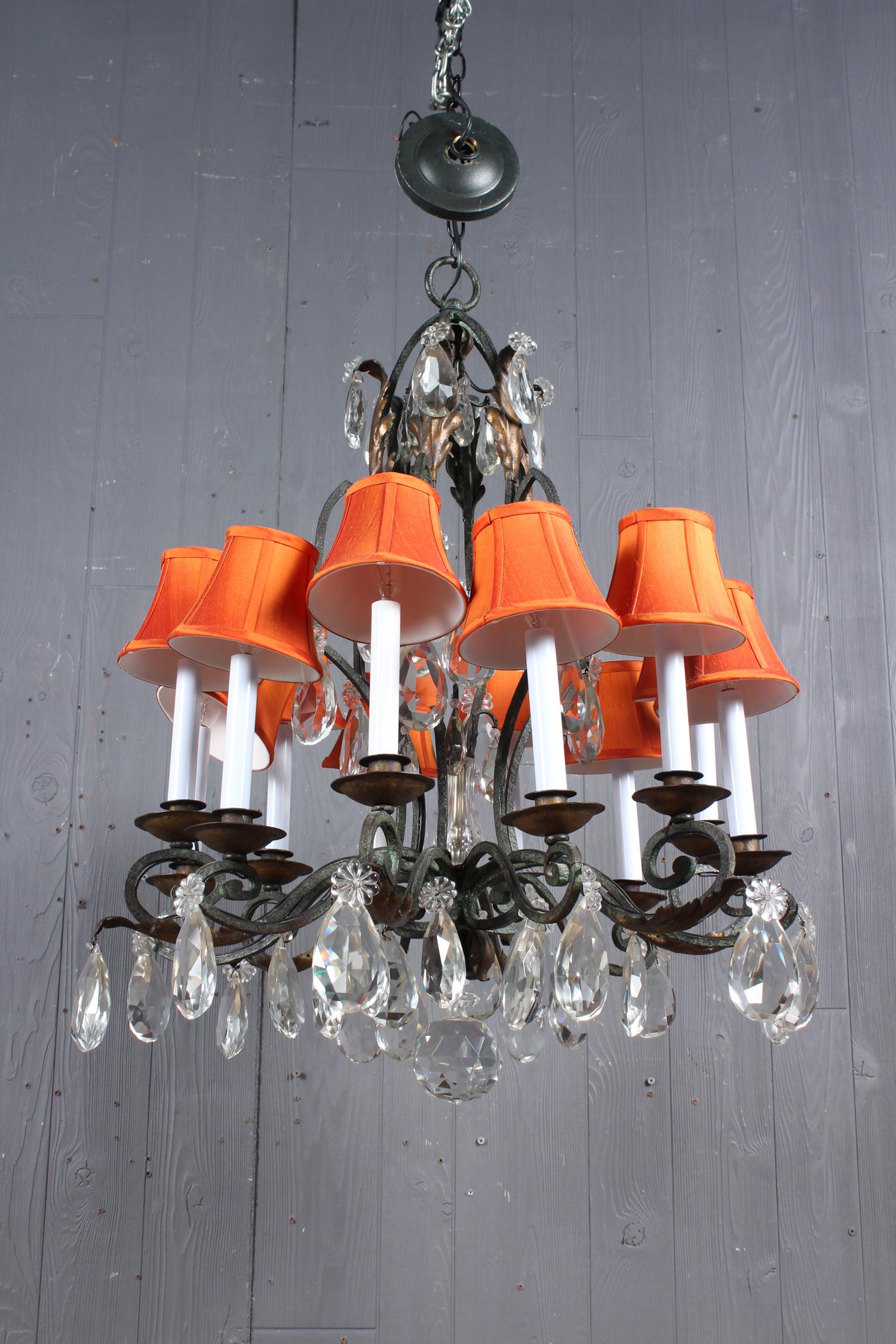 Continental 12 Arm Wrought Iron Chandelier: Wrought Iron Chandelier with Prisms. Size: 32" H x 25" W x 25" D