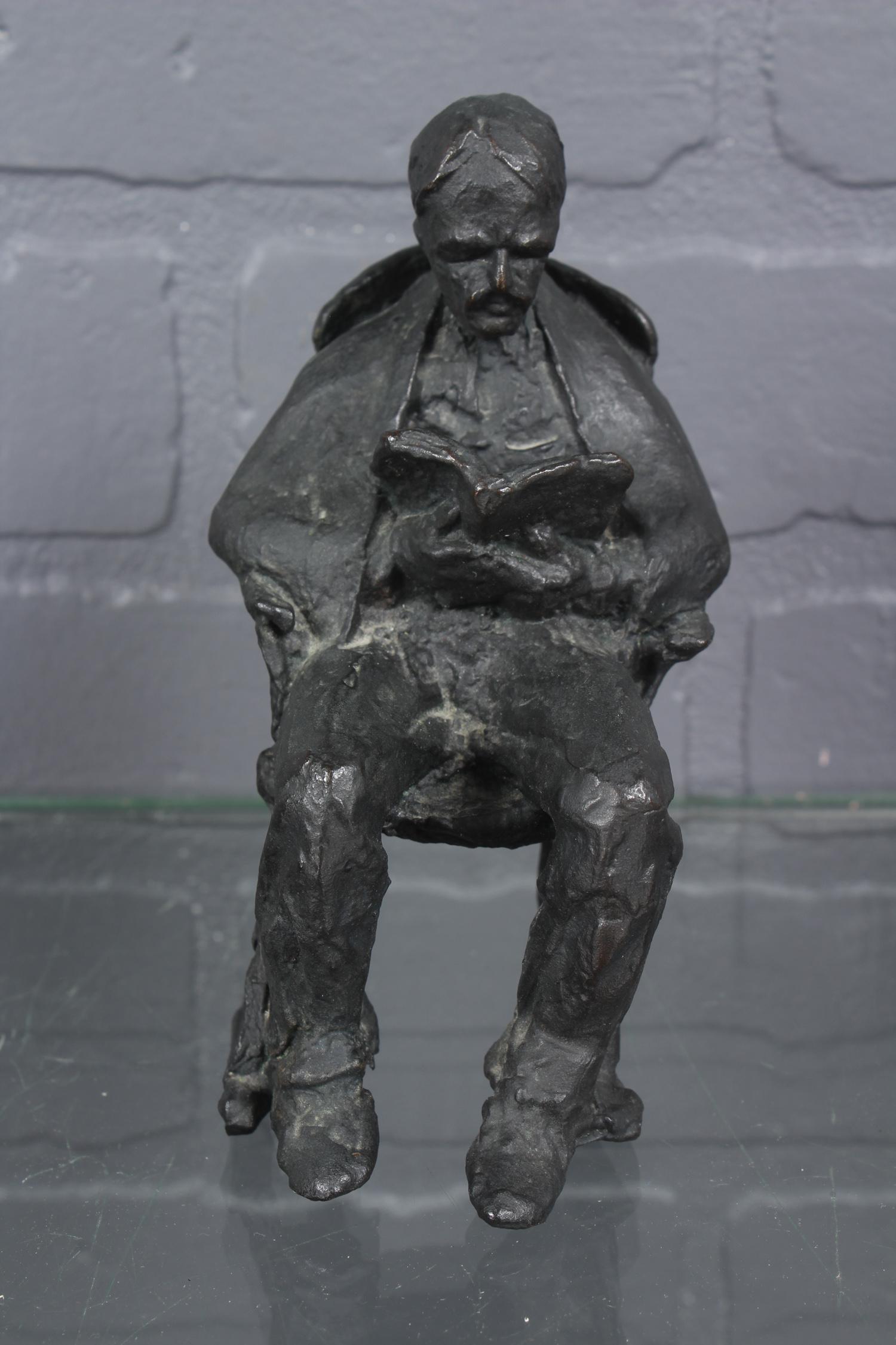 Figural Bronze Man in Chair Reading: Signed Bronze Man in Chair Reading, signed on leg possibly Cardes(?) Size: 5.5" H x 2.5" W x 4" D