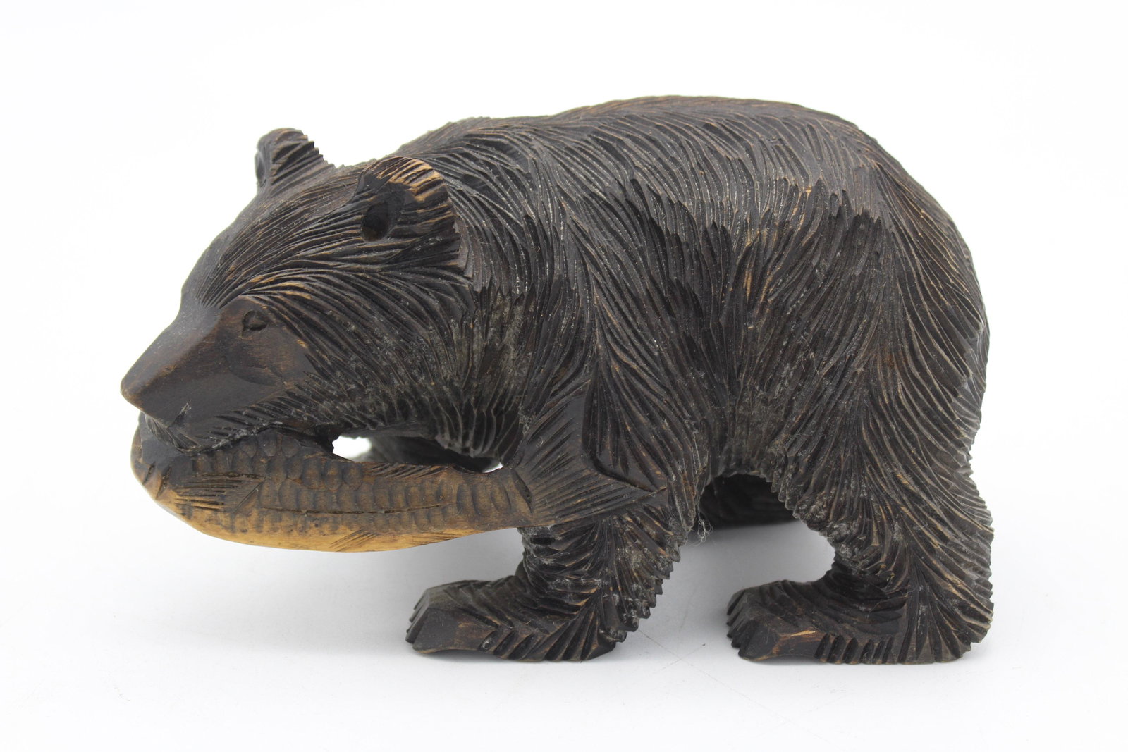 Carved Black Forest Bear with Salmon: Carved Black Forest Bear with Salmon. Size: 5" H x 8.5" W x 4.5" D.