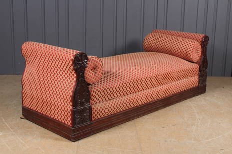 19th C French Restoration Daybed: 19th C French Restoration Daybed. Carved mahogany having bolstered ends and hidden storage. Size: 27" x 76" x 28"