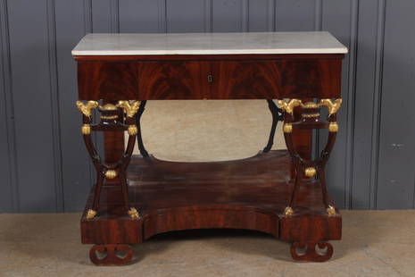 Early 19th C Neoclassical Baltic Console Table: Early 19th C Neoclassical Baltic Console Table. Having a marble top over a central drawer supported on gilt decorated stylized birds and lyre form legs all resting on a platform base with a secret dra