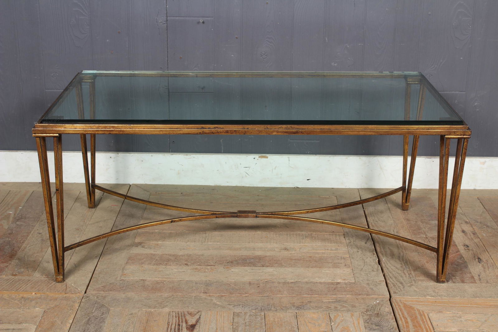 Bronze Finish Glass Top Coffee Table: Bronze Finish Glass Top Coffee Table. Heavy gauge steel with inset glass. Size: 17.5" H x 41.5" W x 21.5" D