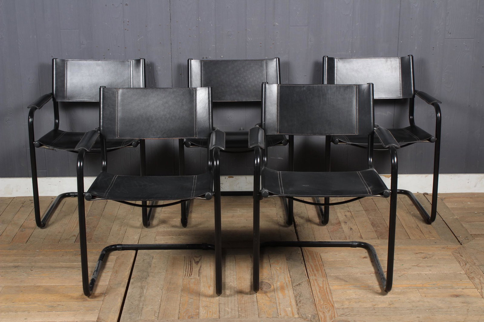 5 Italian Tailored Leather Cantilever Chairs: 5 Italian Tailored Leather Cantilever Chairs, in the manner of Mart Stam. Size: 31.5" H x 24" W x 23" D