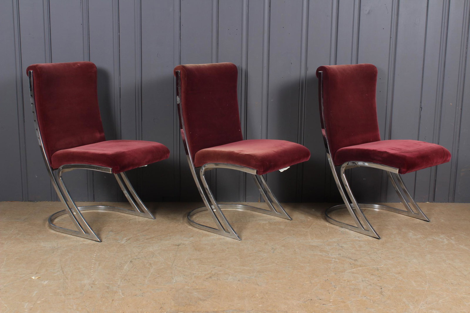 3 Chrome and Maroon Chairs: 3 Chrome and Maroon Chairs. Size: 35.5" H x 19" W x 26" D