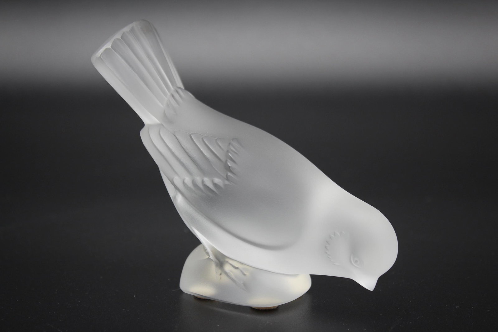 Lalique Crystal Sparrow Head Down Figurine: Lalique Crystal Sparrow Head Down Figurine, Lalique France script signature on base. Size: 4" H x 4.5" W x 2.25" D.