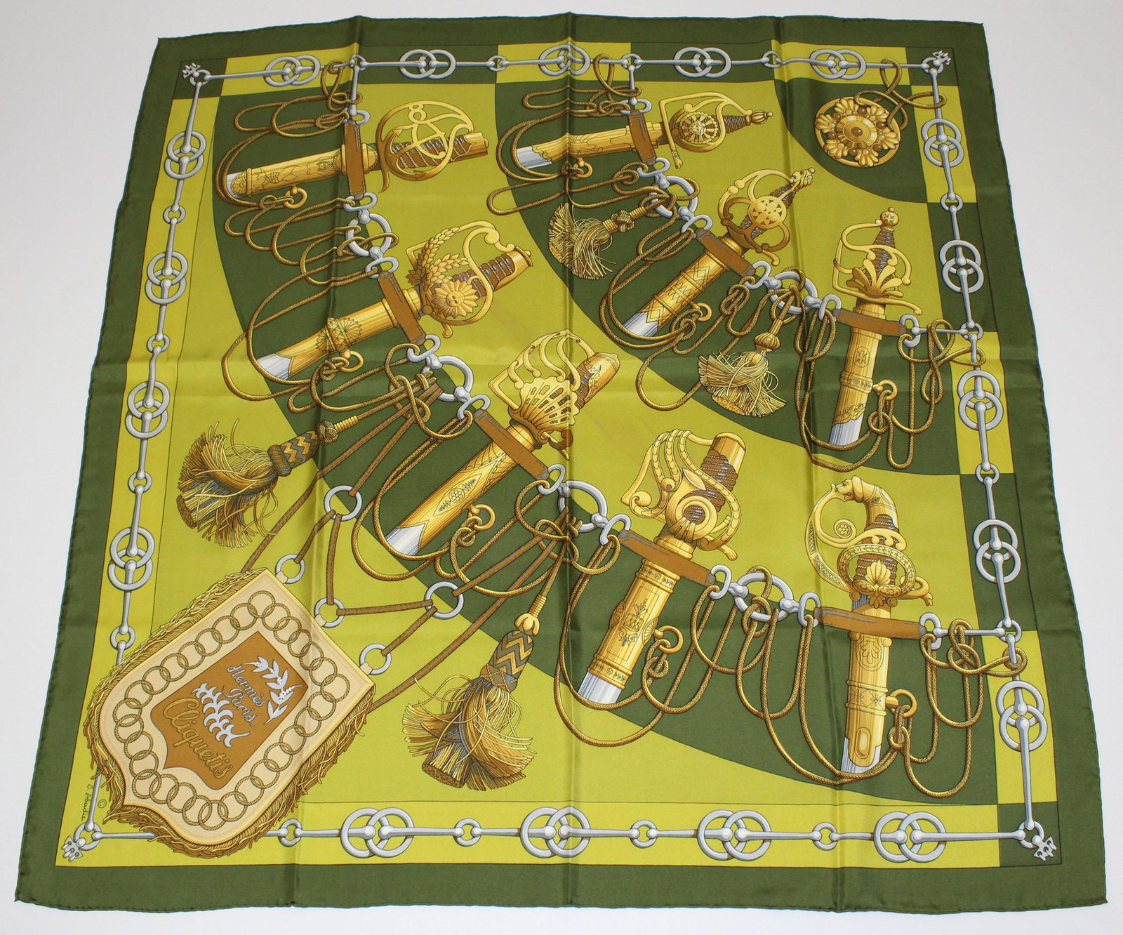 Hermes Paris Silk Scarf Cliquetis: Hermes Paris Silk Scarf Cliquetis, green border, designed by Julia Abadie. Size: 35" x 35".