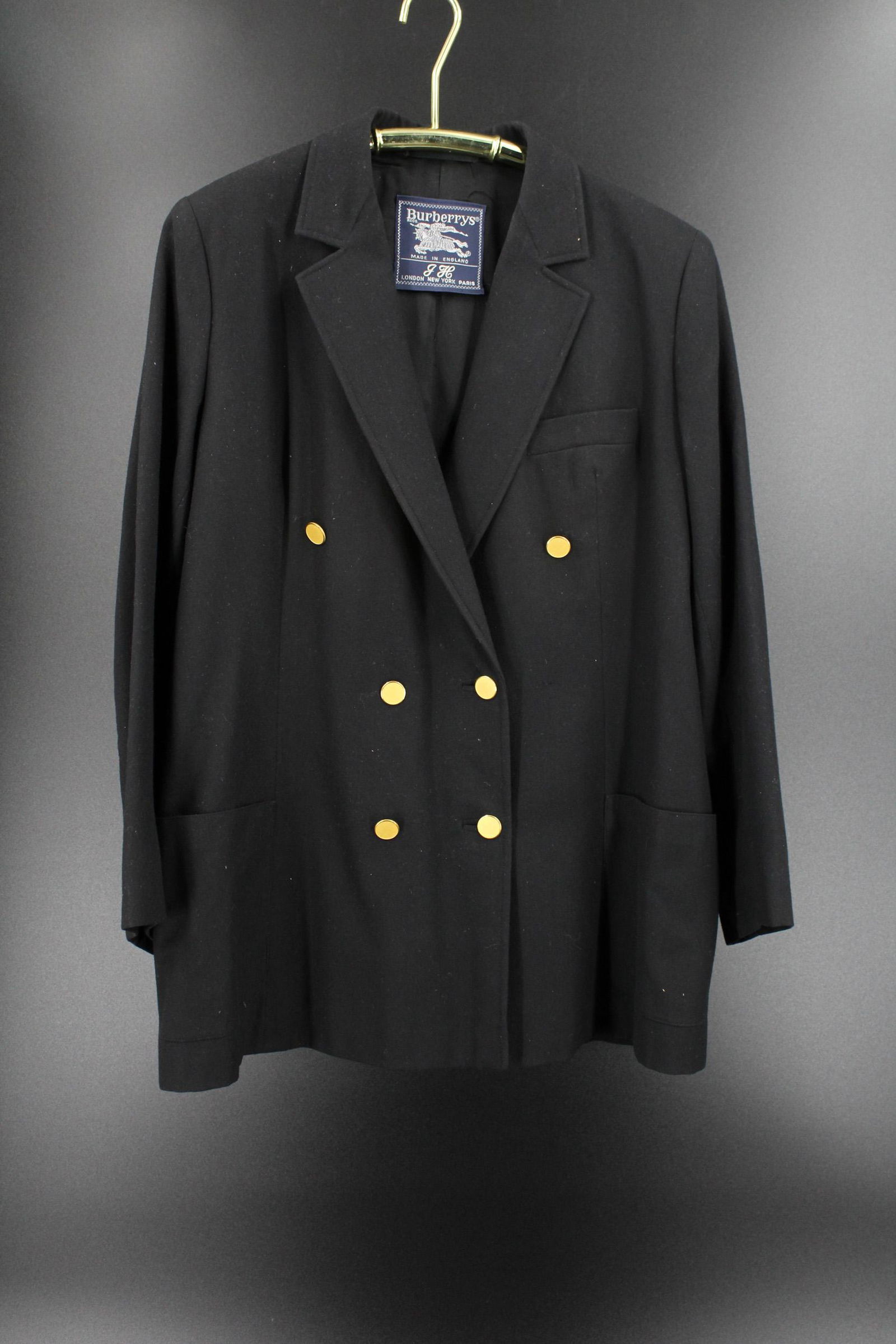 Burberry Double Breasted Jacket: Burberry Double Breasted Jacket, gold colored buttons, labeled Burberrys Made in England, monogrammed JH on label. Measures 17" shoulder to shoulder, 23" sleeve length, 29" shoulder to hem.