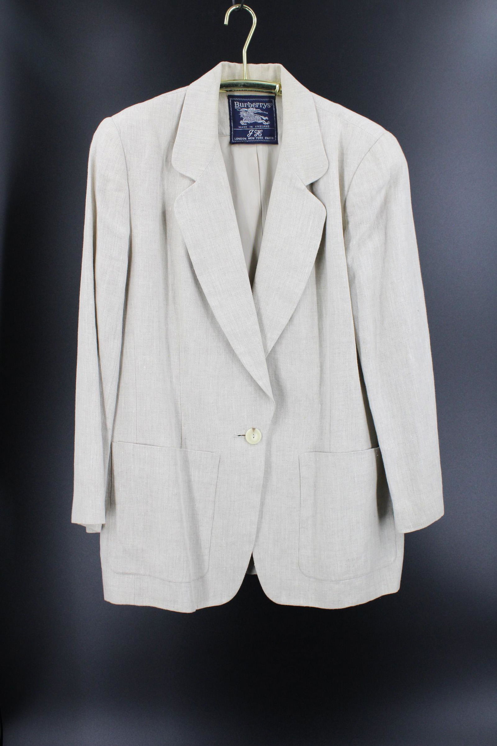 Burberry Linen Blazer: Burberry Tan Blazer, single button jacket, labeled Burberry's Made in England, London, New York, Paris, and monogrammed JH in label. Measures 18" shoulder to shoulder, 24" sleeve length, 31.5" shoulde