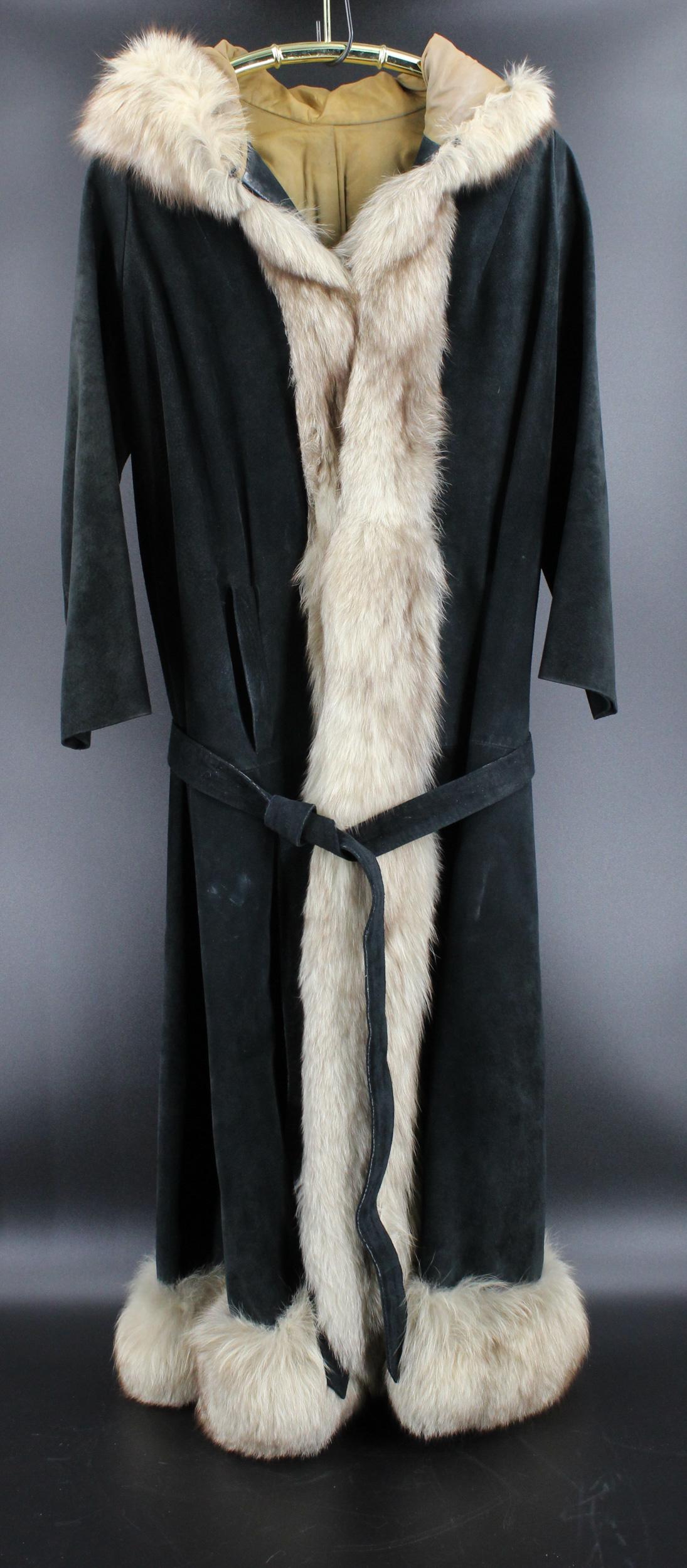 Black Suede and Fur Trimmed Full Length Coat: Black Suede and Fur Trimmed Full Length Coat, hooded coat, hook closures, two pockets, with a leather belt and a suede belt. Measures 17" shoulder to shoulder, 20" sleeve length, 49" shoulder to hem.