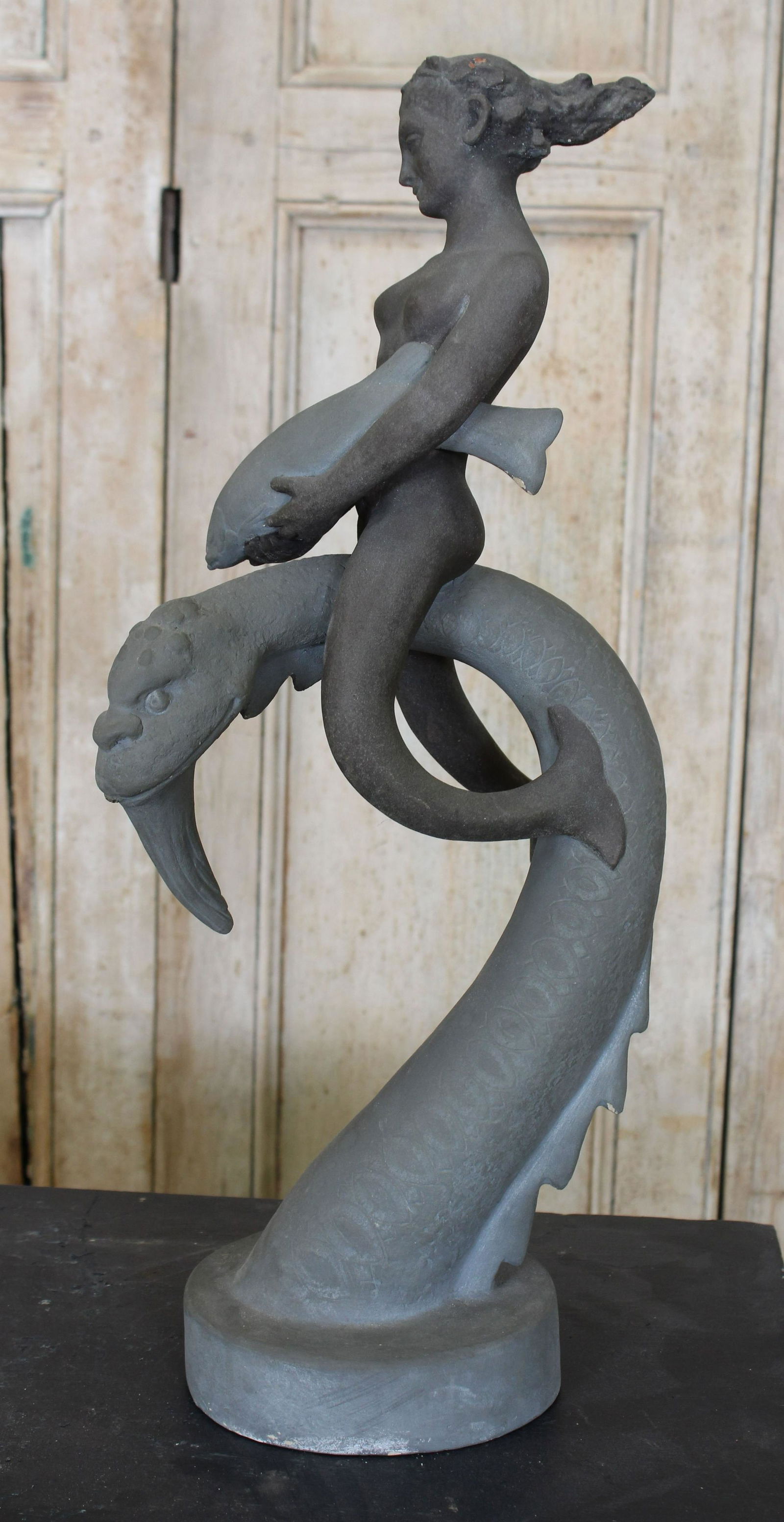 Fritz Franz Engel Mythological Fountain: Fritz Franz Engel Mythological Fountain, (German/American, 1877-1956), mermaid carrying a fish, riding a sea serpent, mixed media, unsigned. Size: 23.25" H x 9.5" W x 9.5" D.