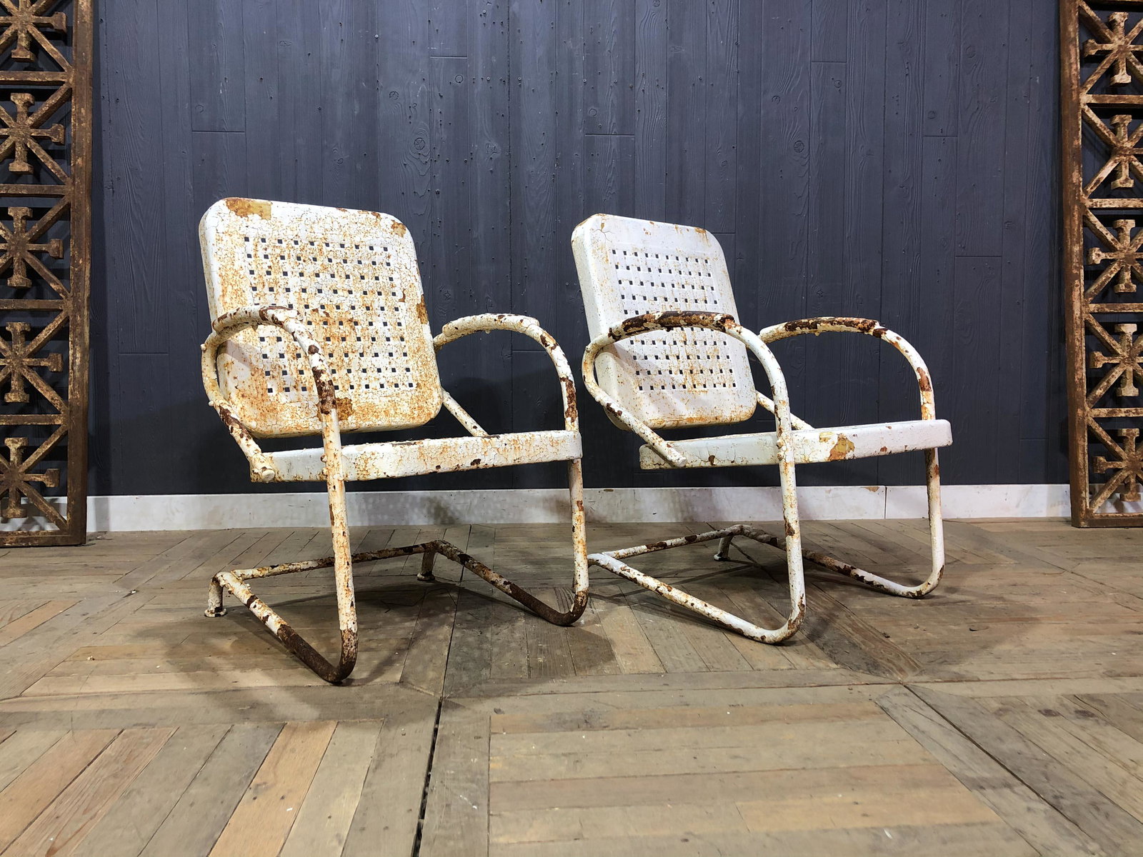 Vintage Metal Garden Chairs: A pair of early 20th century to mid century metal garden chairs. 34" x 22" x 27"