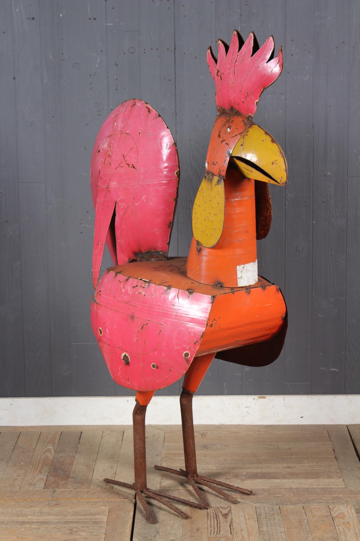 Folk Art Steel Rooster: A large whimsical painted iron rooster garden sculpture. Size: 58.5" H x 17" W x 35" D