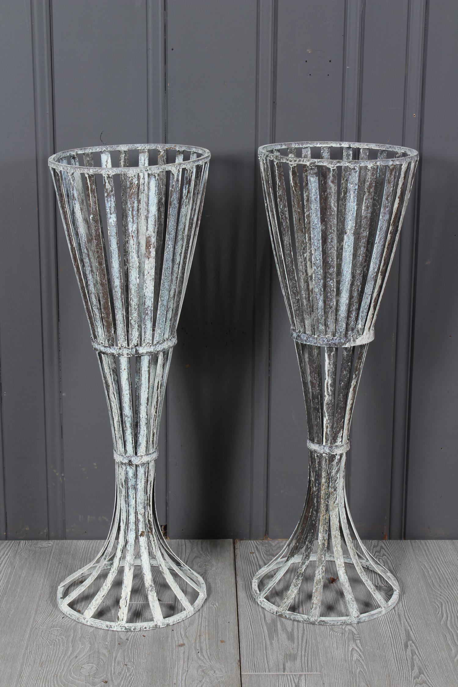 Pair Strapwork Trumpet Form Fernery Planters: A pair of stylish wrought iron conical garden planters with vasiform tops and flared bases. 36.5" H x 12" W x 12" D