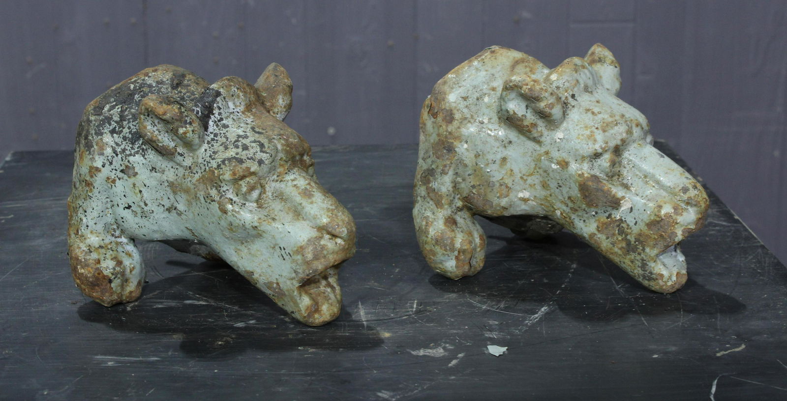 Pair Antique French Cast Iron Spouts: A rare pair of 19th century French cast iron lion fountain heads with remnants of paint. 5" x 5" x 6 1/2"