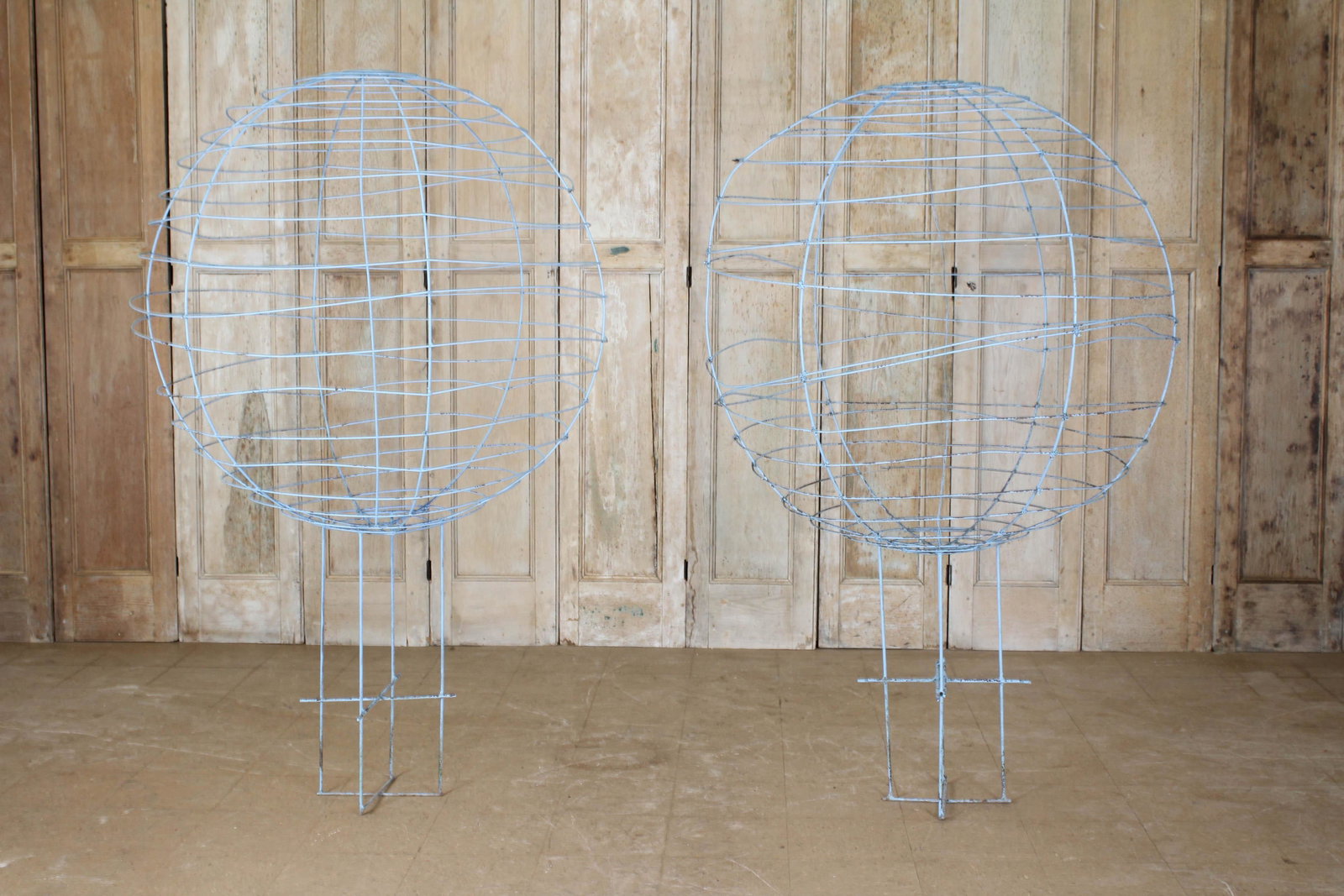 Pair 50" Diameter Wire Sphere Topiaries: Pair Wire Sphere Topiaries. Size: 76" H x 50" diameter