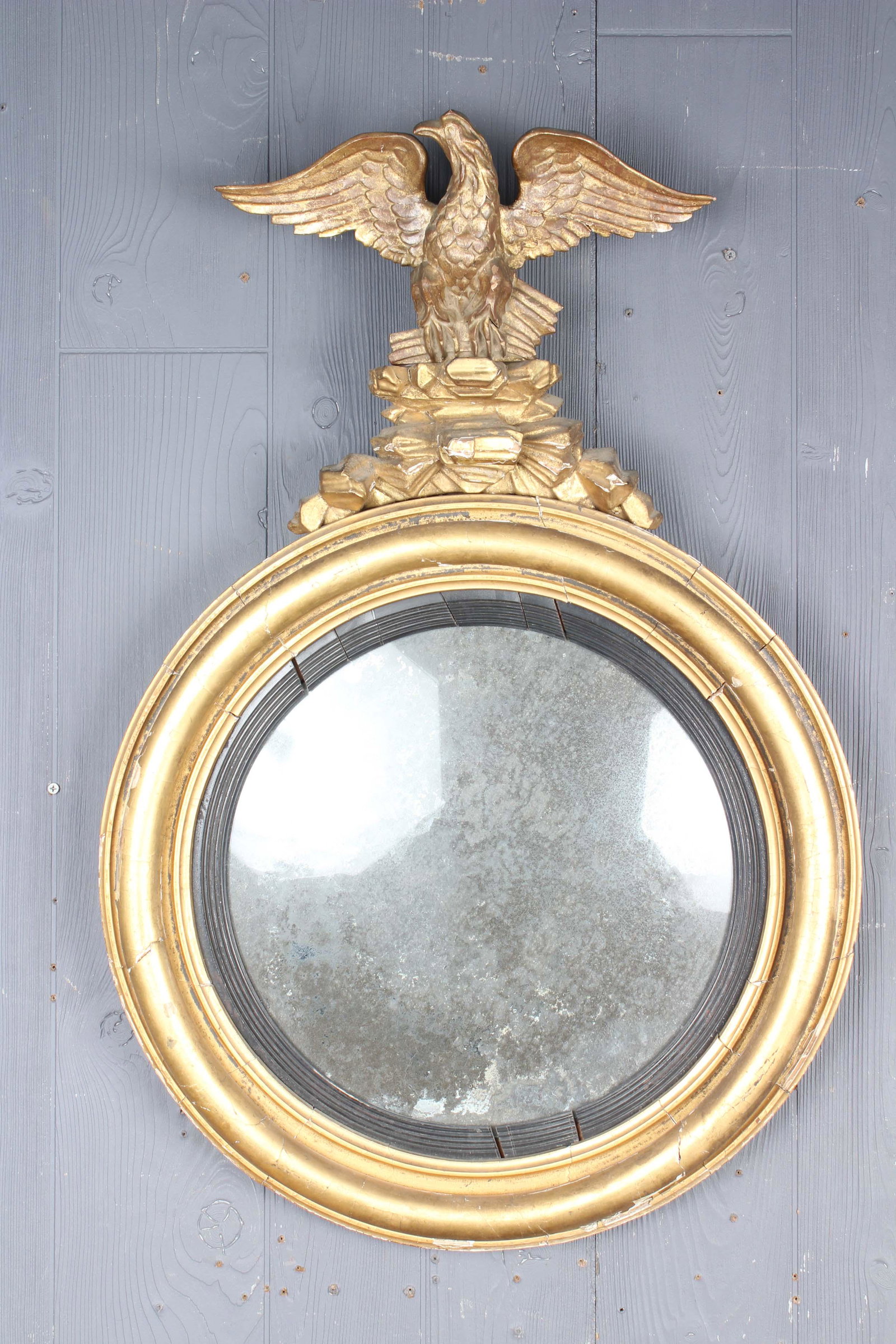 Federal Girandole Mirror: Federal Girandole Mirror, figural crest of a spread wing eagle perched on rocks. Size: 33" H x 21.5" Diameter