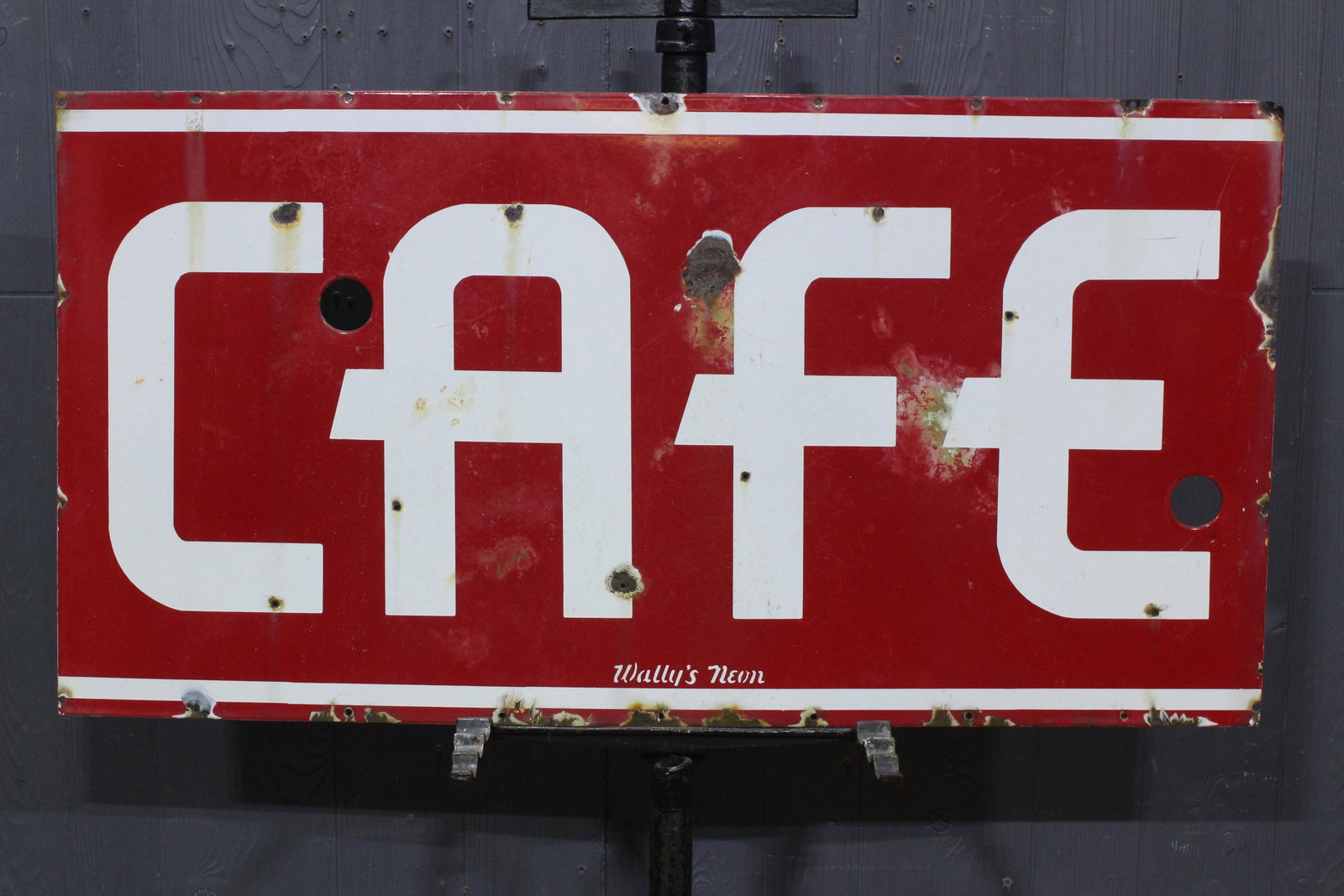 Wally's Neon Cafe Porcelain Advertising Sign: Wally's Neon Cafe Porcelain Advertising Sign, porcelain over iron, red and white Cafe sign. Size: 18" H x 35" W.