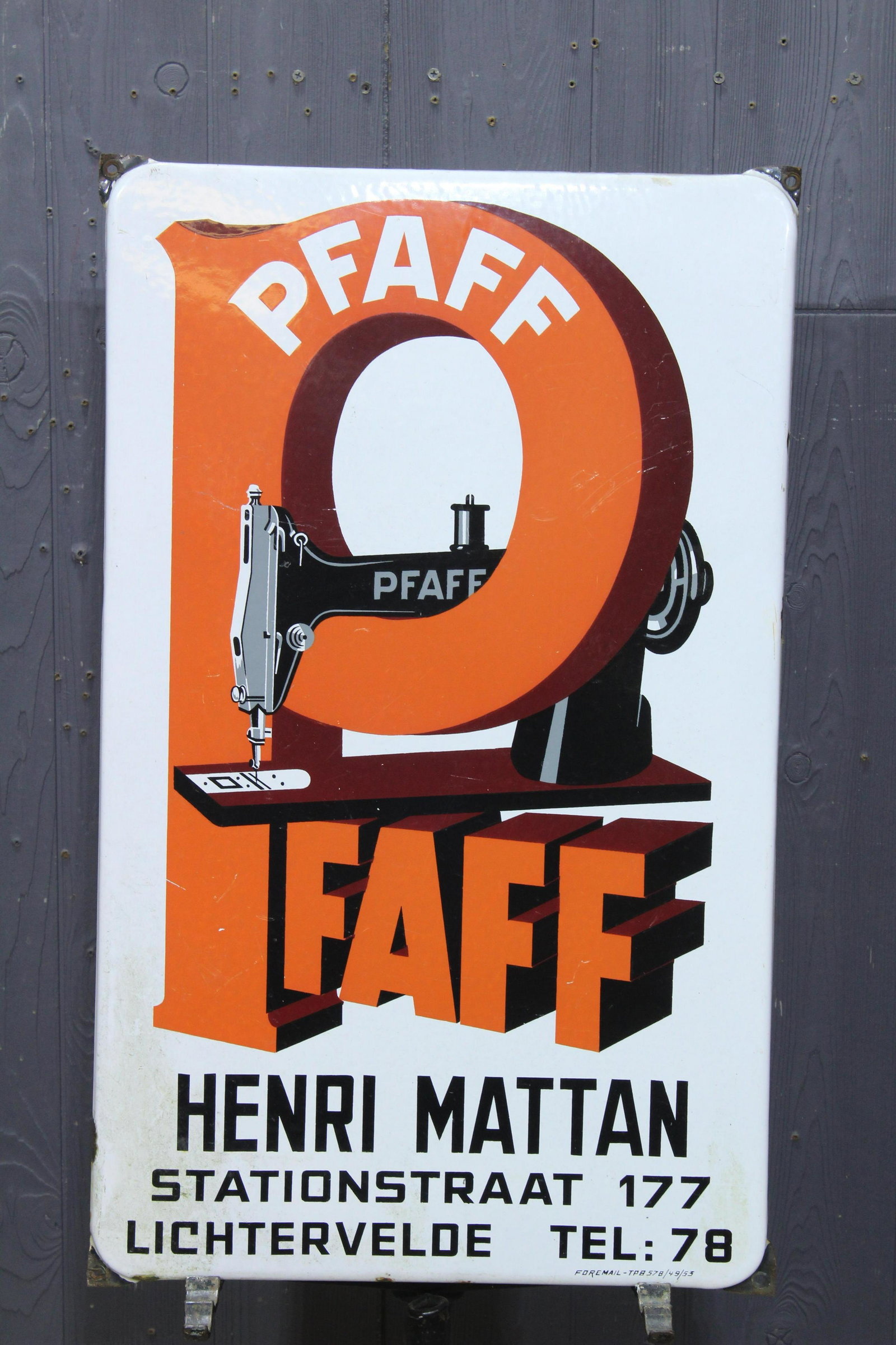 Pfaff Porcelain on Iron Advertising Sign: Pfaff Porcelain on Iron Advertising Sign, Pfaff sewing machine advertisement, "Pfaff, Henri Mattan, Stationstraat 177, Lichtervelde Tel: 78", Foremail - TPB 578/49/53. Size: 28.5" H x 17.5" W.