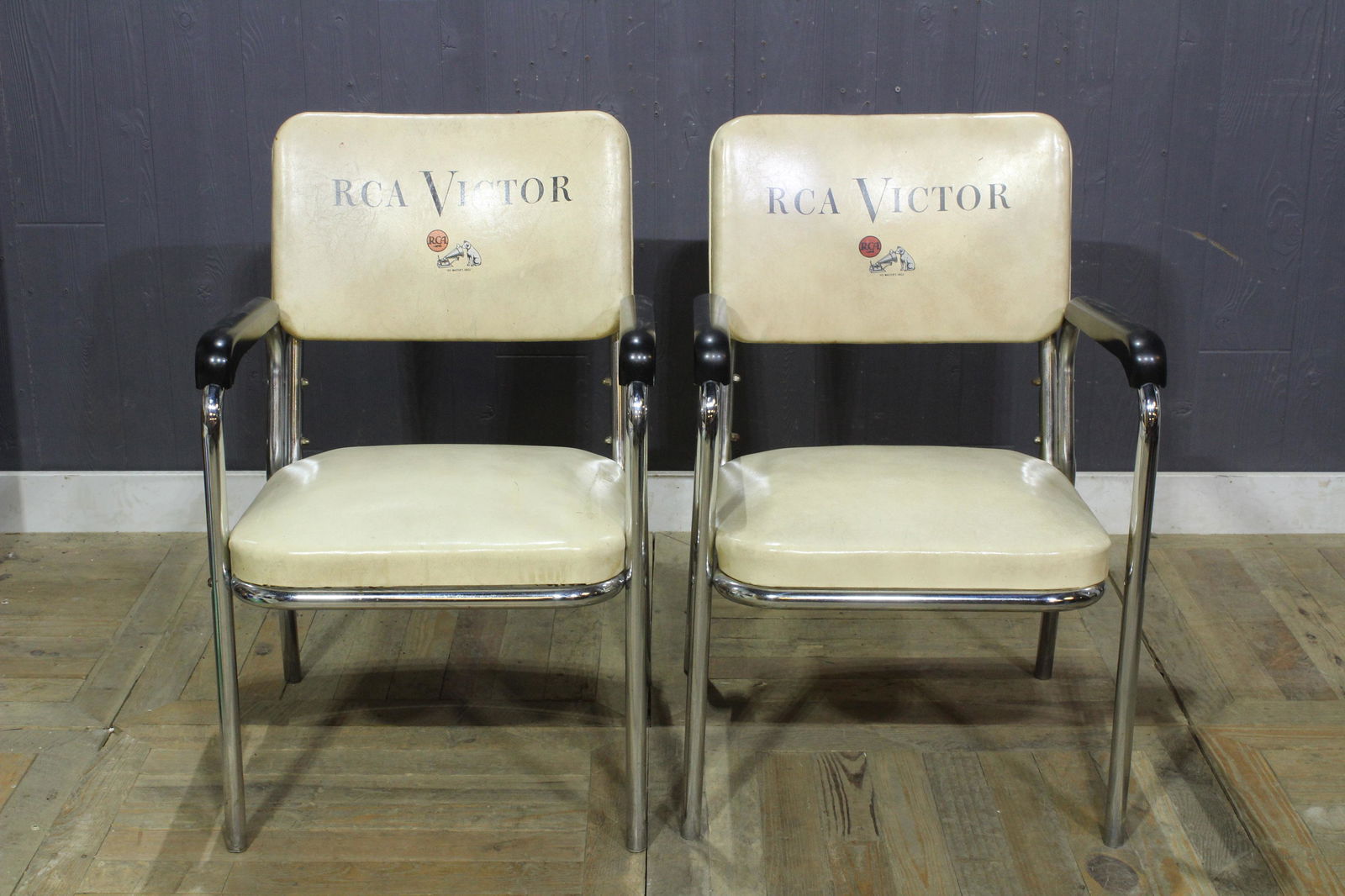 Pair of RCA Victor Listening Armchairs: Pair of RCA Victor Listening Armchairs, tubular chrome and vinyl, RCA Victor logo on seat back, labeled Made by Chromcraft Division or American Fixture & Mfg Co. Size: 33"H x 21.5"W x 20"D