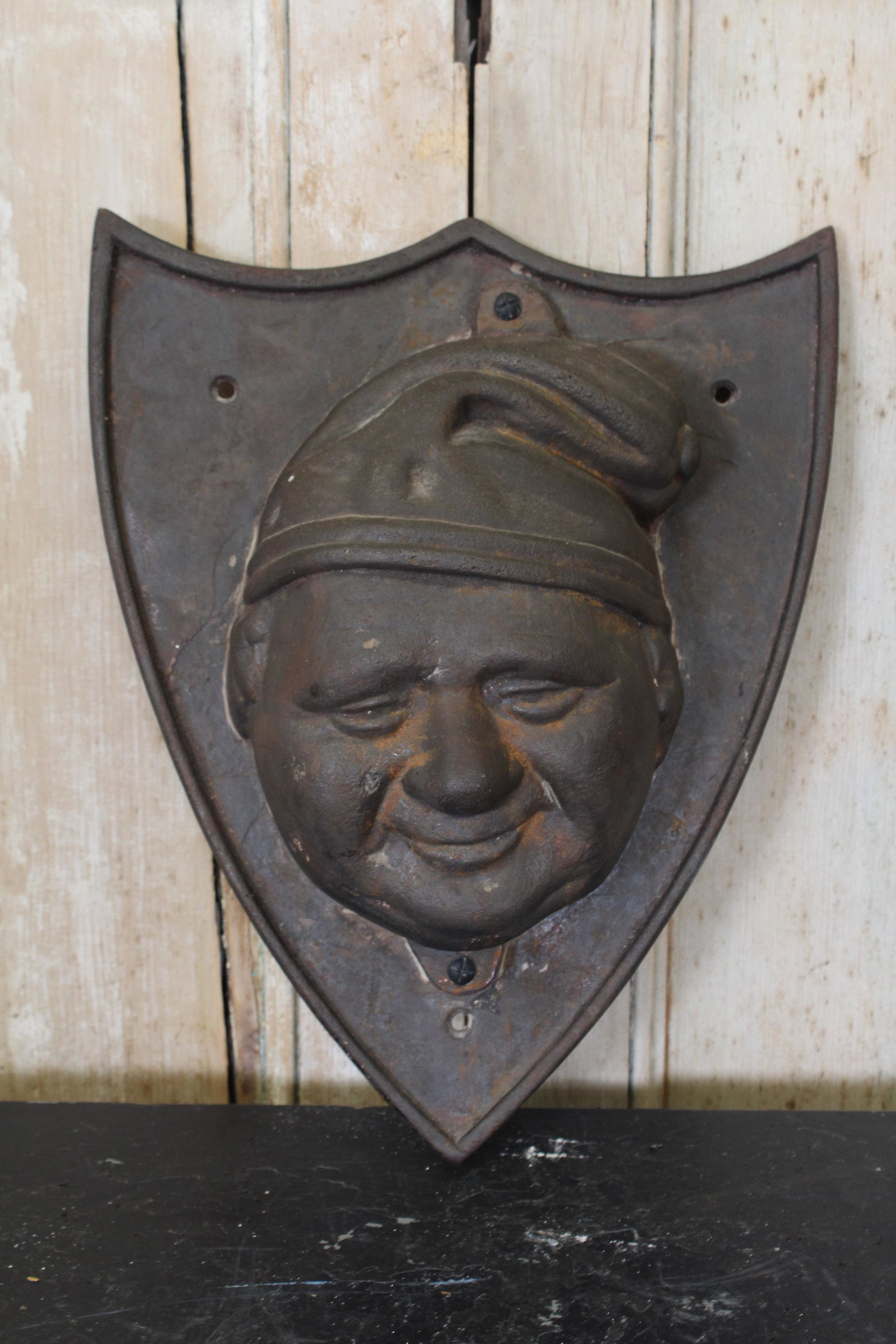 Cast Iron Mr. Punch Plaque: Cast Iron Mr. Punch Plaque. Size: 19" H x 14" W x 4" D.