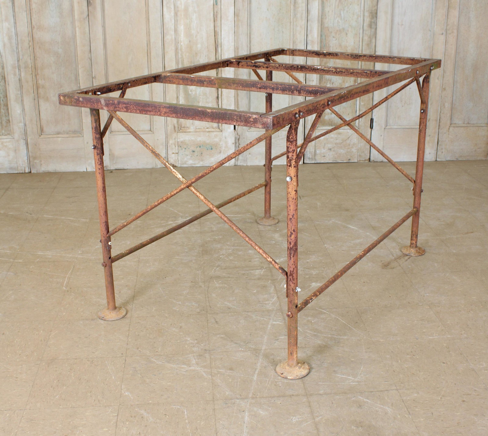 French Potting Table Base: A regency style industrial iron work table base with x-form sides. Size: 36"H x 61.5"W x 33.5"D