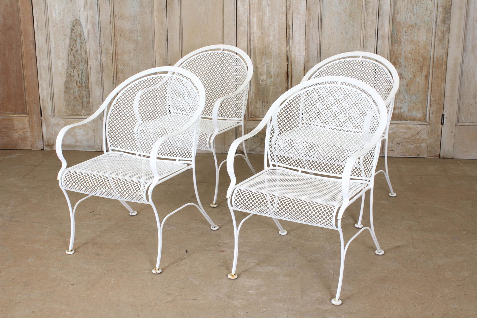 4 Wrought Iron Barrel Back Chairs: A good set of four vintage stylish wood and wrought iron garden chairs with barrel back and continuous arms. 33" H x 22" W x 24" D