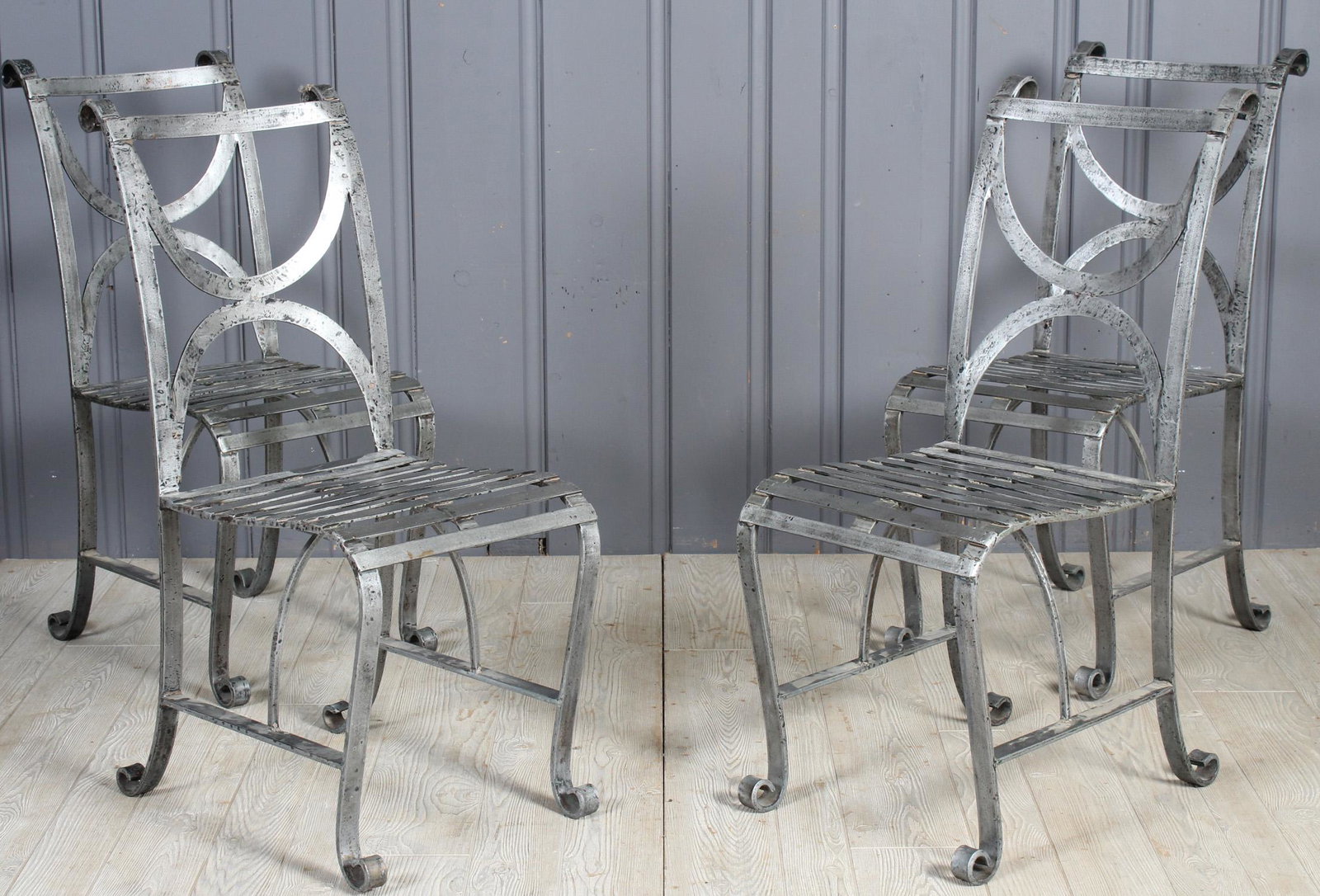 4 Continental Wrought Iron Dining Chairs: 4 Continental Wrought Iron Dining Chairs. En suite with the next lot. Size: 37.5" H x 16" W x 23" D