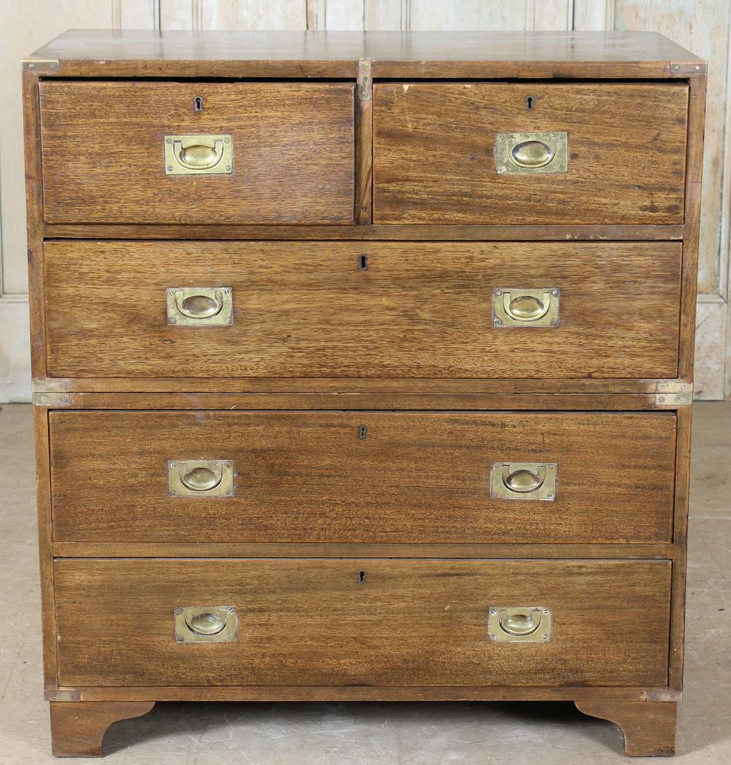 Campaign Chest: A late 19th early 20th century Campaign chest having two over three drawers all raised on bracket feet. Size: 39.5"H x 36"W x 19"D